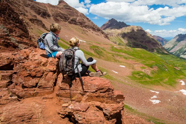 people sitting on mountain