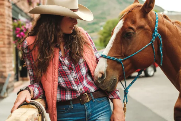 horse and cowgirl at Kemo Sabe's hitching post
